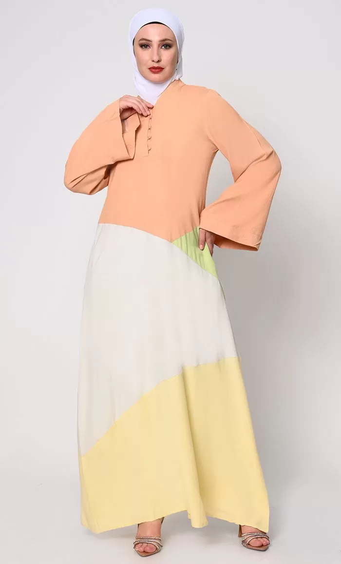 Contemporary Elegance: Abaya with Pastel Color-Blocking Panels and Practical Pockets