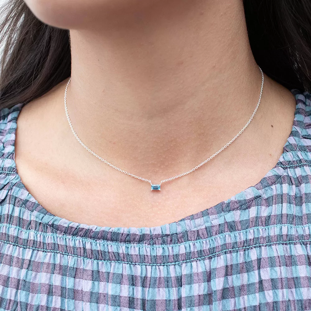 Silver Baguette Solitaire Blue Topaz Necklace