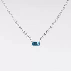 Silver Baguette Solitaire Blue Topaz Necklace