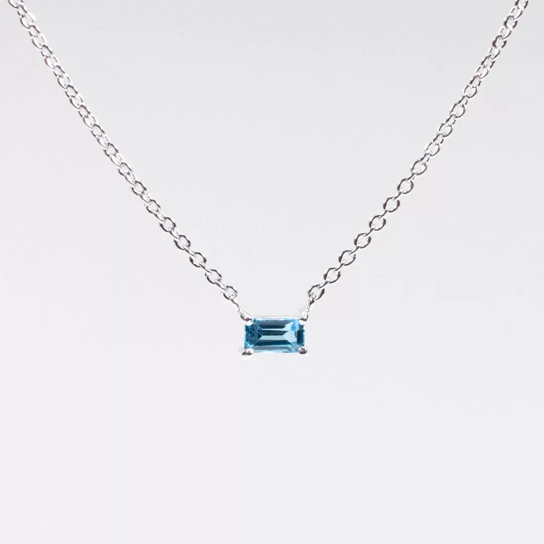 Silver Baguette Solitaire Blue Topaz Necklace